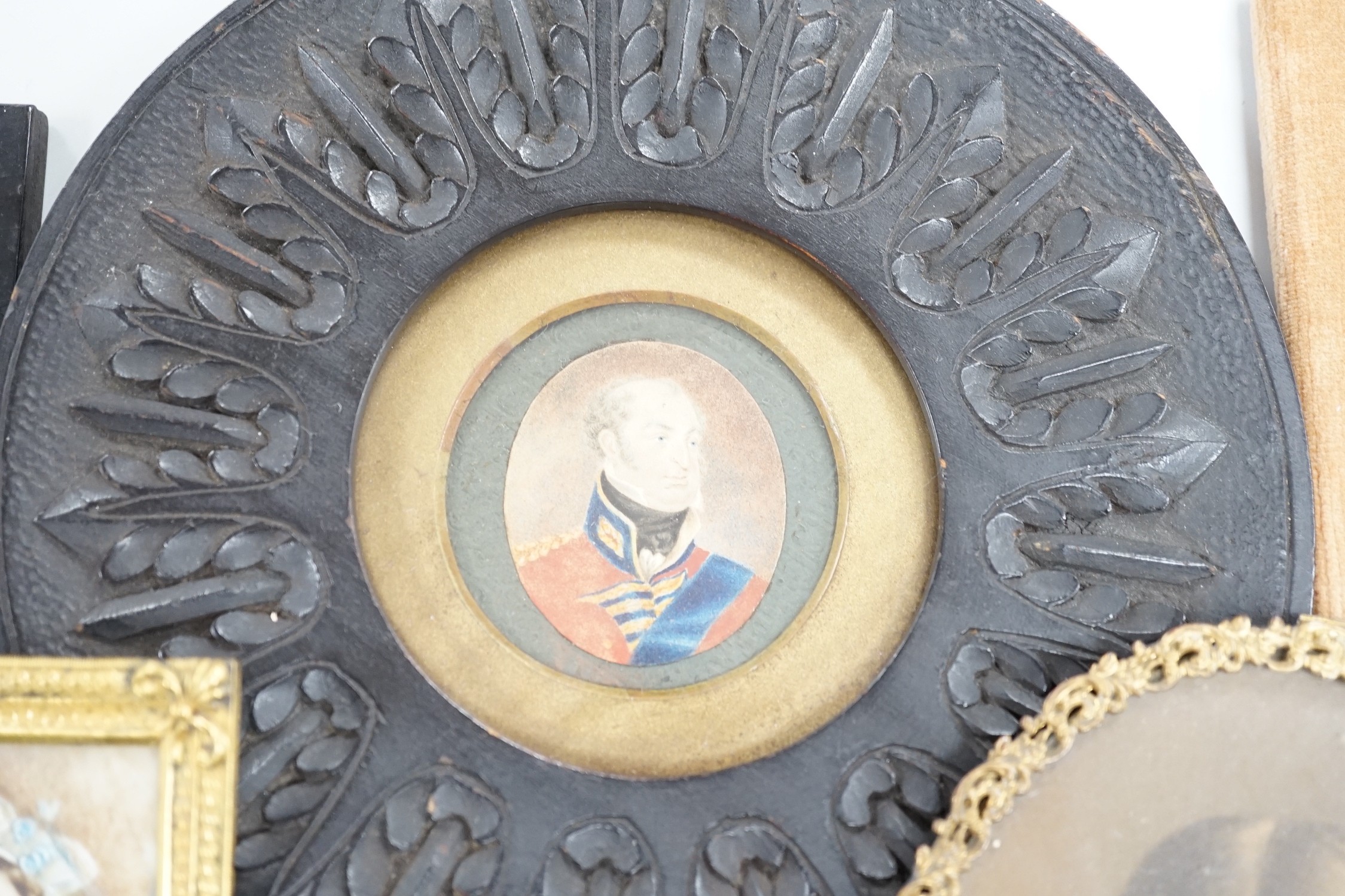 Continental School, 18th century, portrait miniature on ivory, Portrait of a Lady in a red dress, together with six other portraits. To include the subject of military interest: a portrait watercolour of General Isaac Br